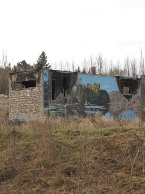 The burnt-out Pie Cart sits in a paddock on the outskirts of Alexandra awaiting developments....