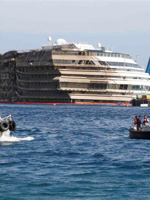 The capsized cruise liner Costa Concordia was raised in a 19-hour operation.  REUTERS/Tony Gentile