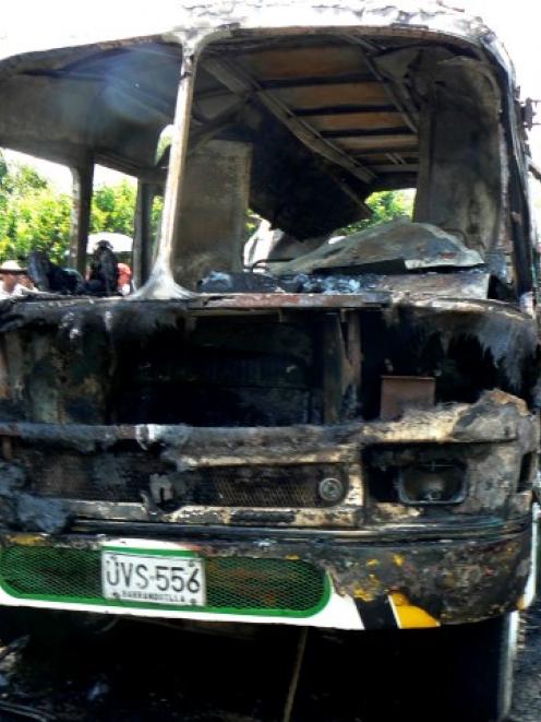 The charred remains of the bus after the fire. REUTERS/Stringer