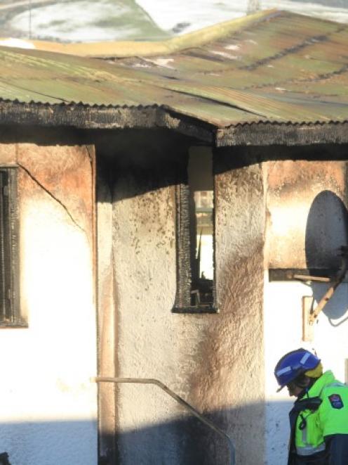 The Clinton house damaged by fire yesterday morning. Photo: Hamish MacLean