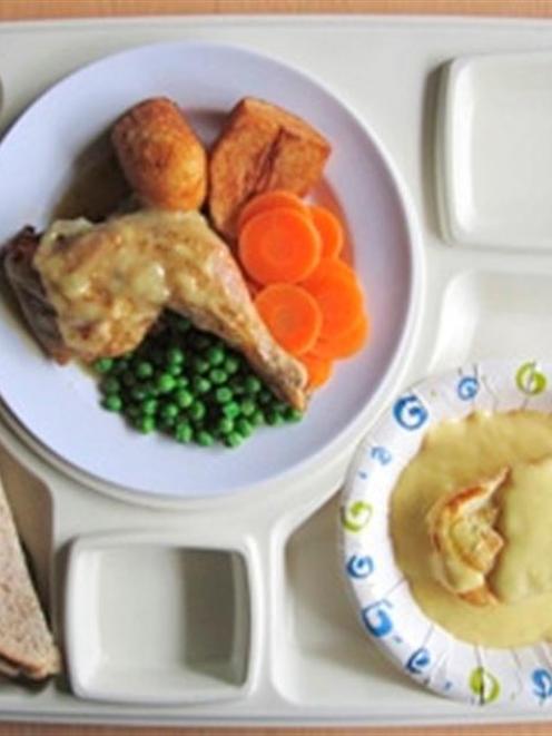 The country's 8500 prisoners will be served  roast chicken, roast potatoes, carrots and peas...