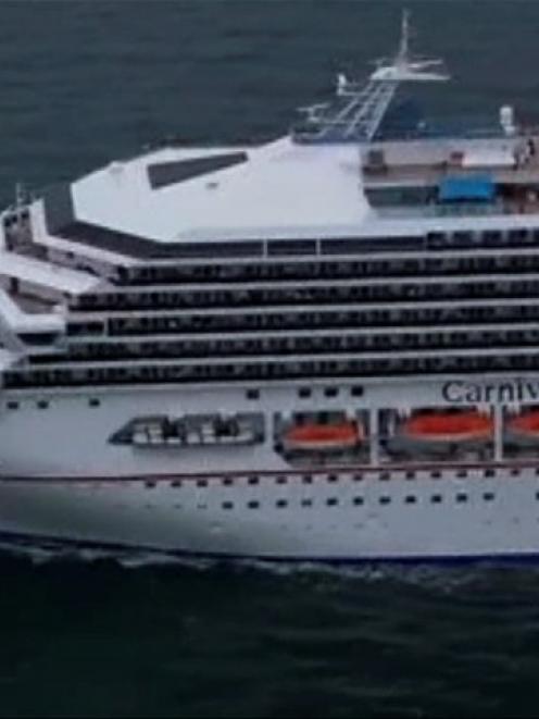 The cruise ship Carnival Triumph cruise ship is towed in this video frame grab from NBC News...