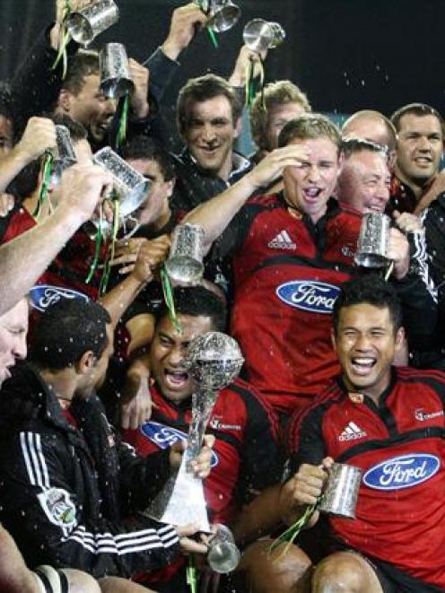 The Crusaders celebrate their win against the Waratahs in the 2008 Super 14 final at AMI Stadium...