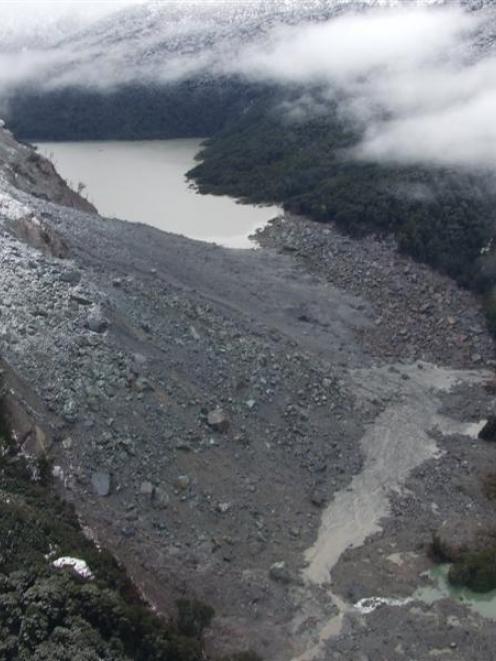 The dammed Young River looking upstream towards the lake formed by the landslip at left. Photo by...