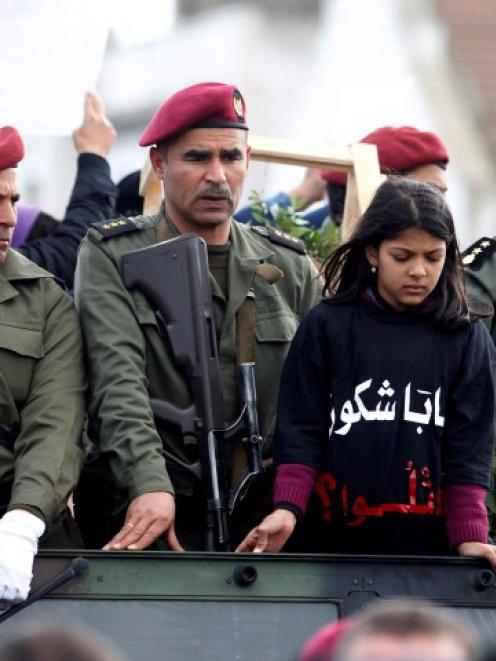 The daughter of assassinated prominent Tunisian opposition politician Chokri Belaid takes part in...