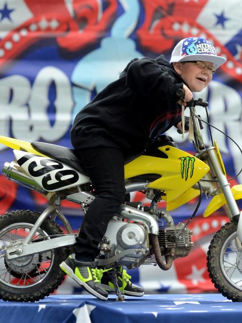 The devil may care . . . Joel George, of Mosgiel, emulates his hero, motocross star Travis...