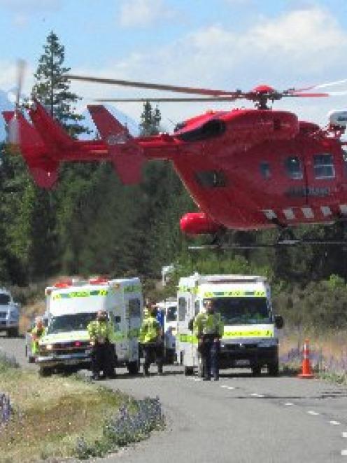 The Dunedin Rescue Helicopter takes two patients from the road between Lake Middleton and Lake...