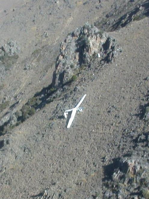 The Duo Discus glider, above, which crashed into Mt St Cuthbert, overlooking Omarama, yesterday....
