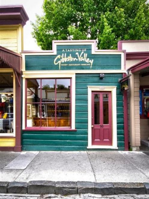 The exterior of the historic building housing the new ''A Tasting of Gibbston Valley Winery''...