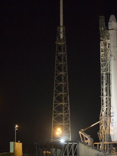 The Falcon 9 rocket to be launched by SpaceX on a cargo re-supply service mission to the...