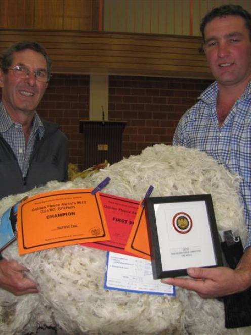 The father and son team of Allan and Simon Paterson with their prize-winning merino fleece. Photo...