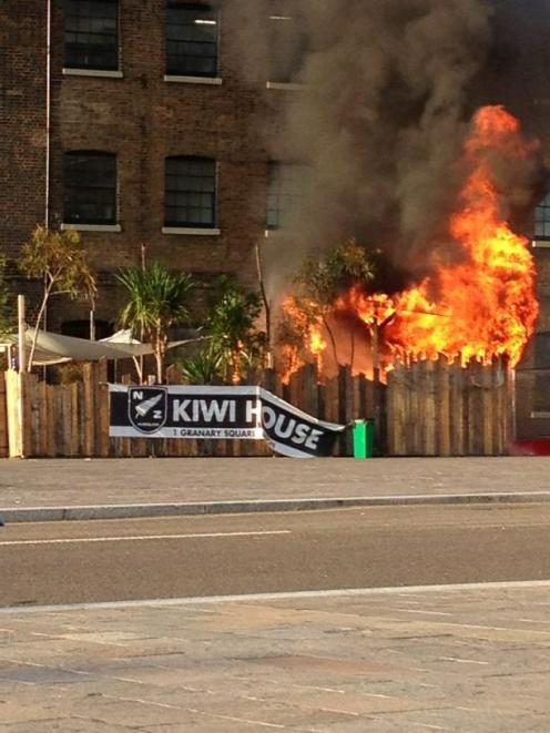 The fire burns at Kiwi House in London. Photo / Chris Williamson @CMJWilliamson