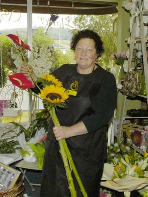 The Flower Shop Roslyn owner Jude Trin in her store. Photo by Jane Dawber.