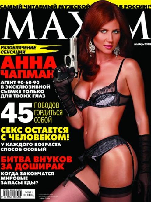 The front cover of November 2010 issue of Russian Maxim shows Anna Chapman posing with a gun.  ...