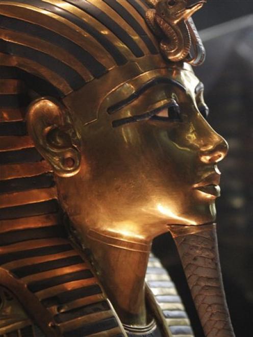 The funeral mask of King Tutankhamun is seen in the Egyptian Museum in Cairo, Egypt.  (AP Photo...