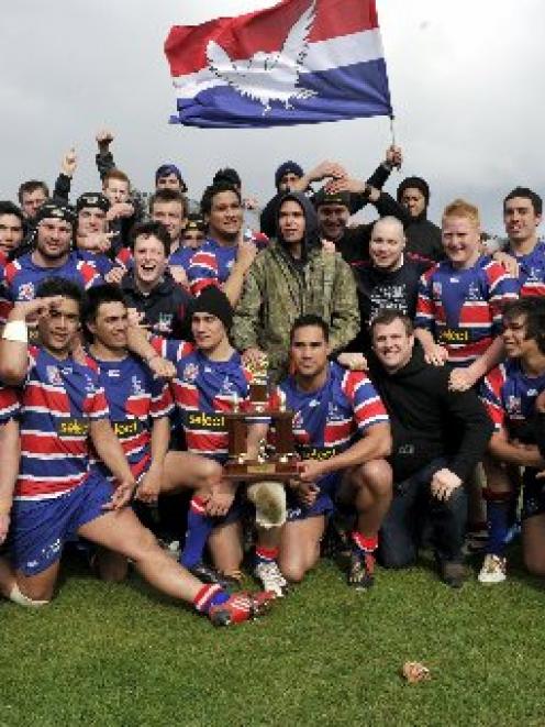 The Hawks celebrate their 28-12 win over Pirates in the Otago Rugby League grand final on...