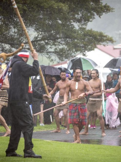 The hikoi from the anti-TPP protest in Auckland is welcomed back onto Te Tii Marae, Waitangi....