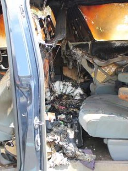 The interior of the car was gutted by the flames. Photo / Manawatu Guardian