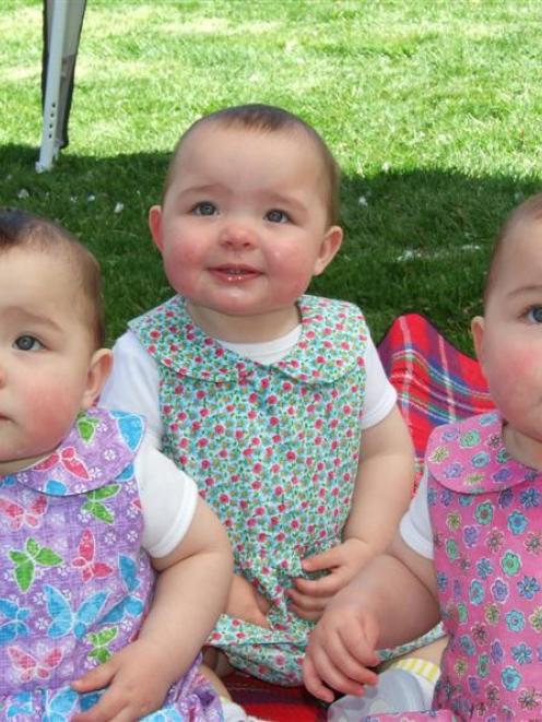 The Kelly triplets (from left) Haylee, Charlotte and Olivia turned 1 yesterday, and celebrated...