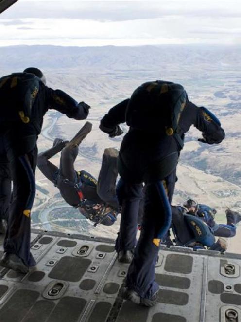 The Kiwi Blue parachute team jumps over Wanaka in preparation for the airshow. Photo by Marjorie...