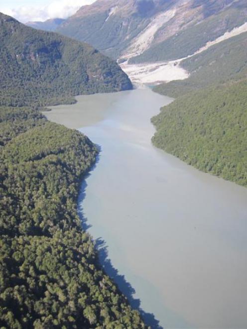 The landslip (top, centre of image) and new lake in the Dart Valley. The track detour will...