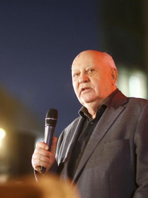 The last  president of the Soviet Union, Mikhail Gorbachev, speaks at the former Berlin Wall...