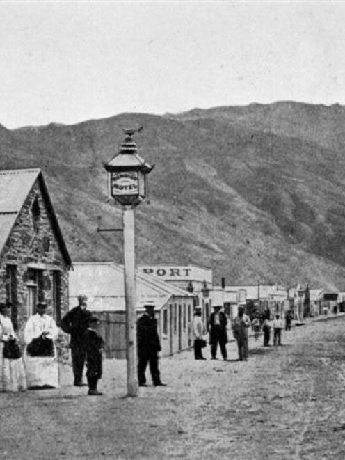 The main street of Clyde in 1876. In the left foreground are Messrs John Grindley (butcher) and...