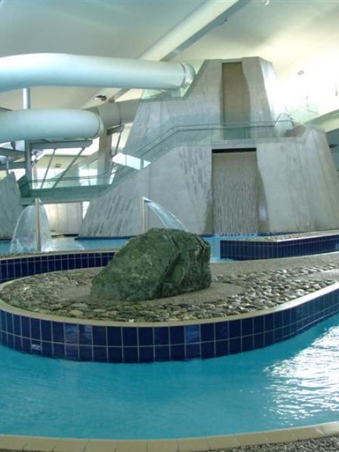 The "man-made mountain" (rear) which gives access to the two hydroslides inside Alpine Aqualand.