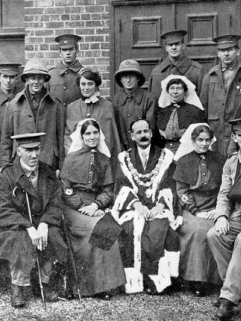 The Mayor of Dunedin, Mr J. J. Clarke, with some of the wounded soldiers and the Australian...