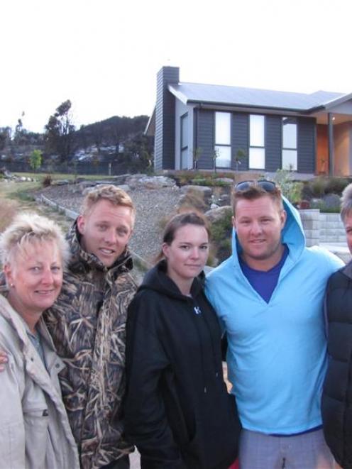 The McCarroll family of Hong Kong were relieved their holiday home was not harmed. From left,...