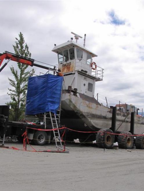 The Minaret Station barge's pusher boat this week at Waterfall Creek,  where it is undergoing...