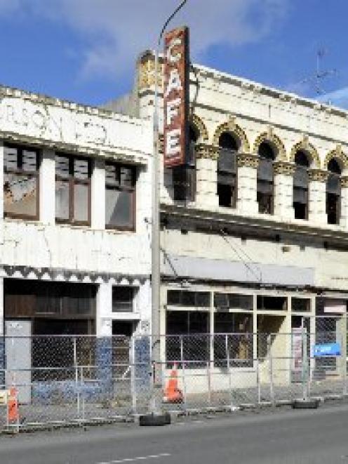 The N. & E.S. Paterson and Barrons buildings, demolition of which  is  set to resume soon, after...