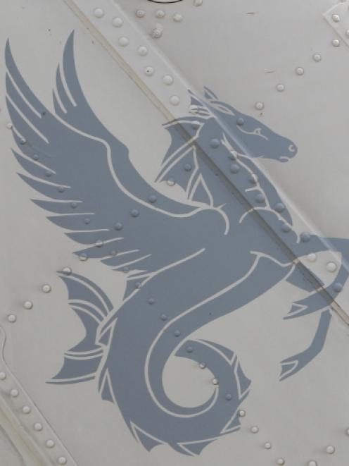 The navy's five Seasprite helicopters have new logos on their tails. The "hippocampus" -...
