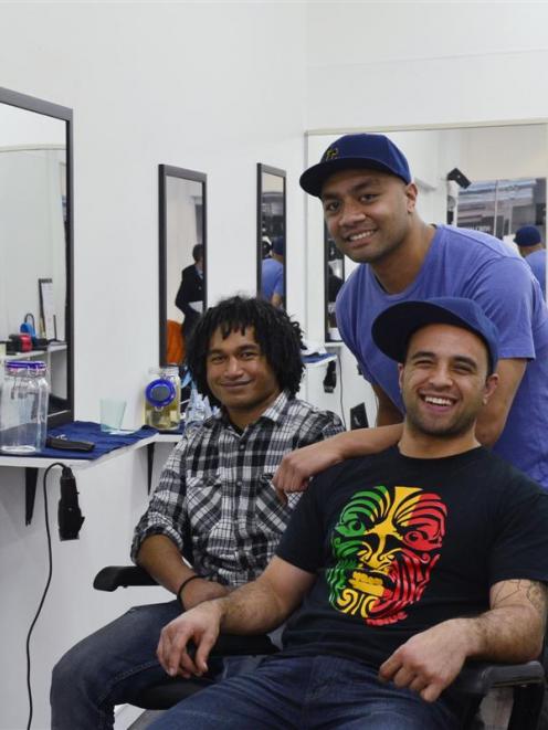 The new owners of Fresh Crew Barbers, from left, Mase Makabaha (29), Vea Fonua (29) and Joel...