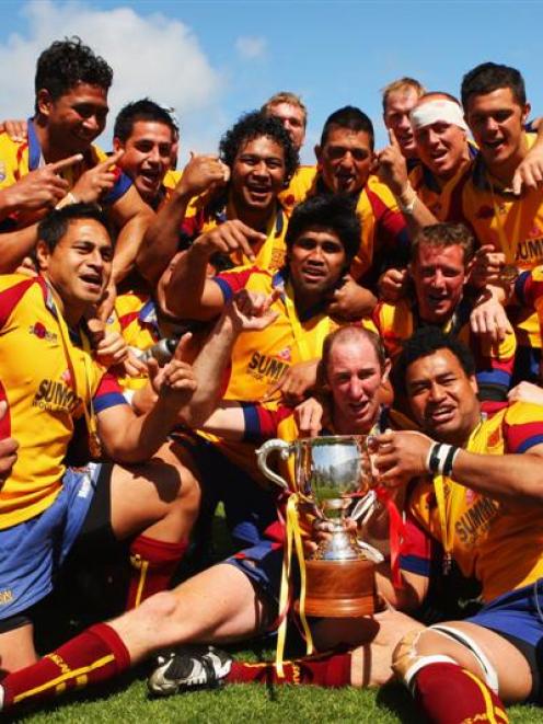 The North Otago team celebrates with the Lochore Cup after beating West Coast in the final in...