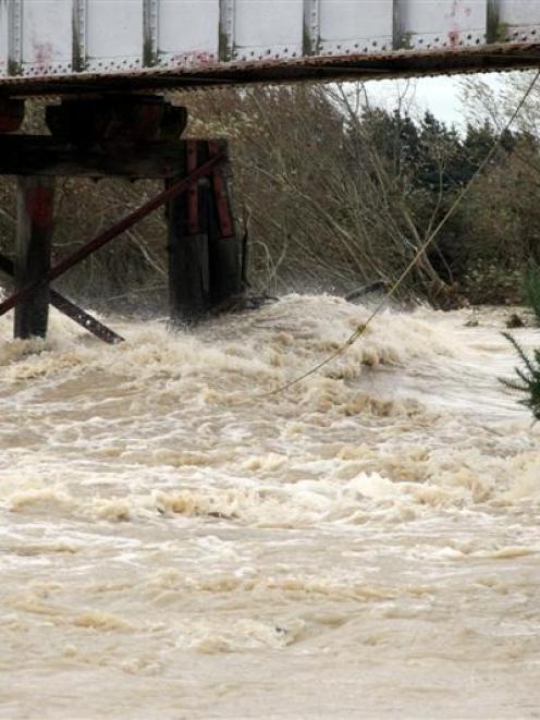 The Oreti river in flood near Turkey Bush road today. Credit:NZPA / Dianne Manson.
