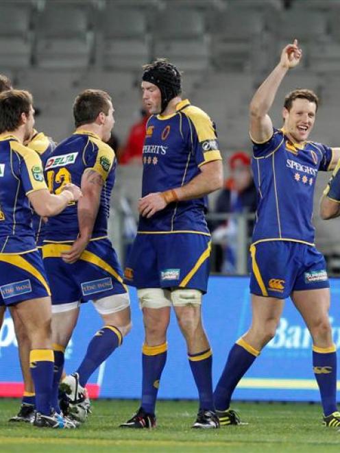 The Otago team celebrates after beating Auckland 32-25 last night.