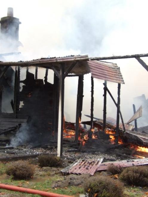 The Paradise Homestead was reduced to ashes and rubble by the fire. Photo Christina McDonald