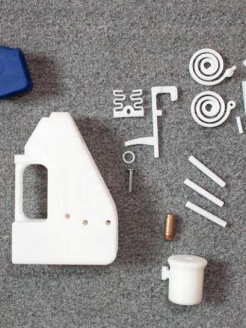 The pieces of a gun made using a 3-D printer. Photo supplied.