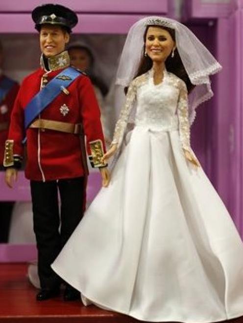 The Prince William and Catherine Middleton dolls that have gone on sale in Hamleys toy store in...