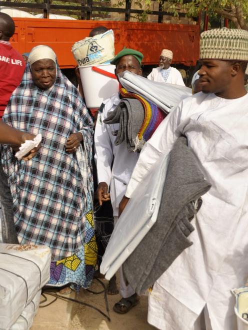 The Red Cross in Kano distributes relief materials to displaced victims of the Boko Haram...