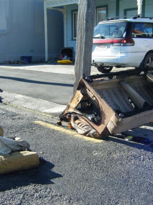 The remains of a burnt couch in Castle St North yesterday. It was one of several furniture fires...
