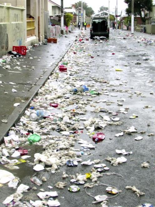 The remains of the Hyde St keg party at 6.30pm on Saturday. Photo by Christine O'Connor.