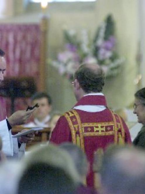 The Rev Michael Wallace (left) is handed the keys of All 
...