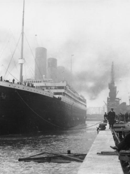The RMS  Titanic  at the docks in April 1912, just days before its departure on its maiden voyage...