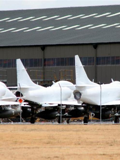 The Royal New Zealand Air Force's surplus Skyhawks are covered in protective latex at Blenheim in...