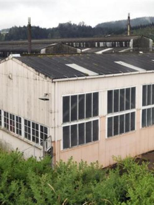 The run-down Iron Roller Mills Building in Green Island. Photo by Gerard O'Brien.