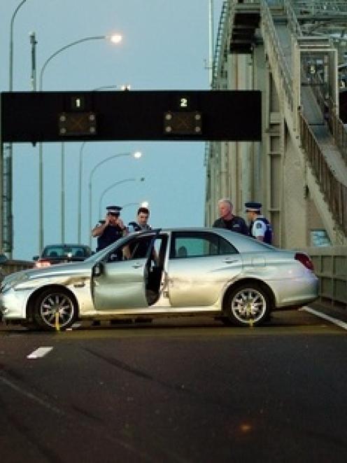 The scene on Auckland Harbour Bridge after a shooting incident and a police car chase. Photo /...