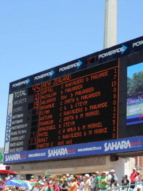 The scoreboard shows the New Zealand first innings total on day one of the first test against...