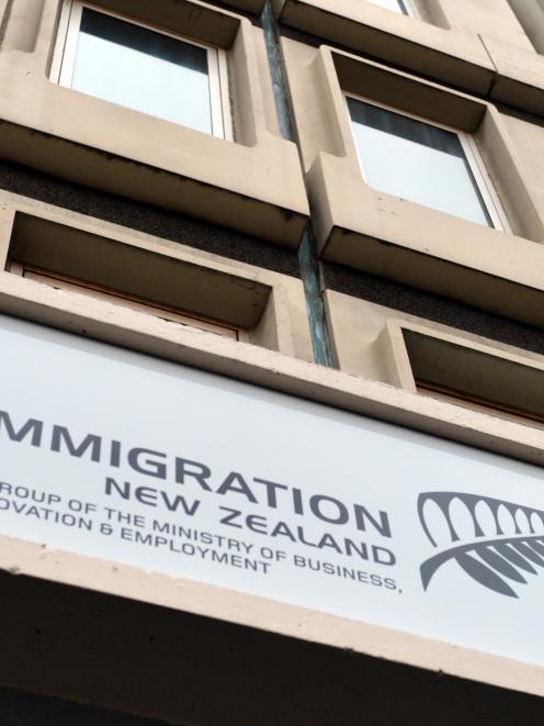 The sign above the Immigration New Zealand offices in Bond Street, Dunedin. Photo by Gerard O'Brien.